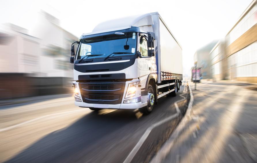 White Truck in motion isolated with clipping path