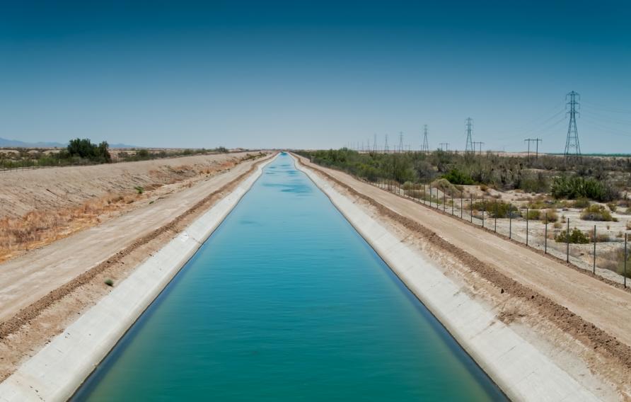 Drone shot of the Coachella Canal, an aqueduct in the desert which carries water from the Colorado River across Riverside and Imperial Counties in California, from the All-American Canal to the Coachella Valley.