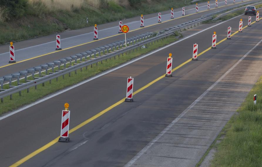 Road barriers marking closed highway lane due to road works