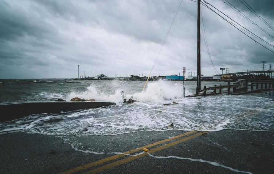 Water crashing over bridge during Hurricane Harvey in Kemah Texas