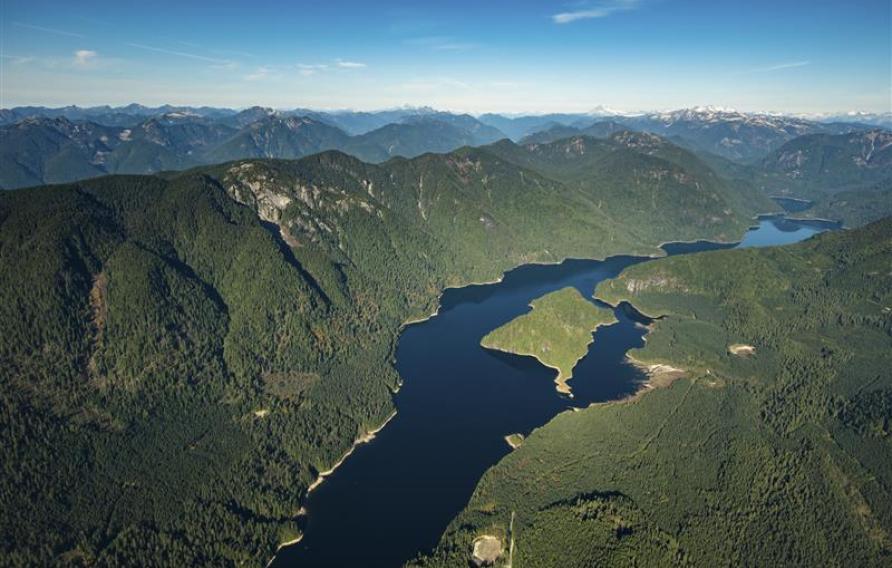 Stock aerial photo of the Coquitlam Lake Reservoir and mountains, Canada