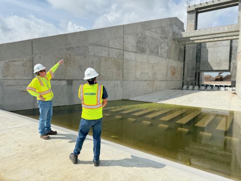 Jacobs engineers at water control structure