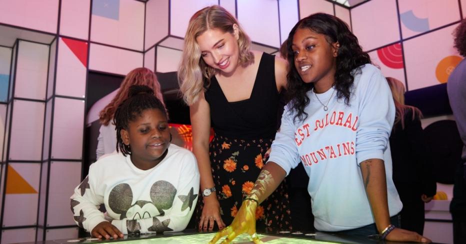 Lucy May and students at a STEAM event