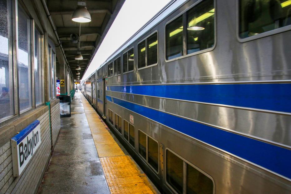 A long Island Railroad Train is arriving from the east at the Babylon Station.